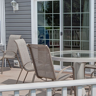 Patio furniture on a deck.